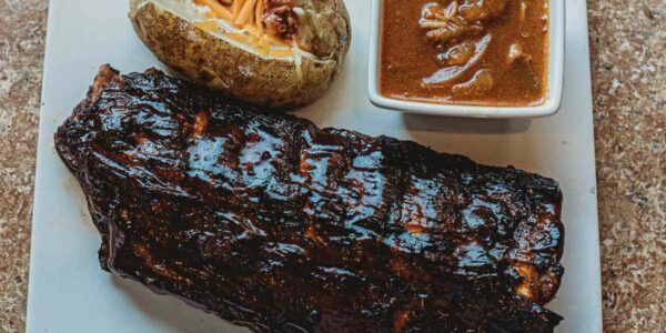 A photo of a half rack of BBQ ribs
